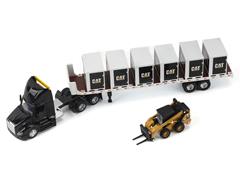 DIECAST MASTERS #84675 - Peterbilt 579 Tractor in Black and Flatbed Trailer with Caterpillar 272D Wheeled Skid Steer Loader and 6 Pallet Boxes