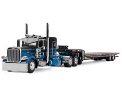 DCP #60-2190 - Peterbilt Model 389 with Flat Top Sleeper in Blue and Black Hauling Landoll 440B-50CA Traveling Axle Trailer