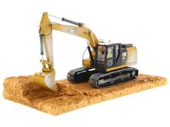 85701 - Diecast Masters Caterpillar 320F Tracked Excavator Weathering Series