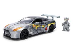 JADA TOYS #36285 - 2009 Nissan Skyline in Silver with Mechagodzilla Figure - Godzilla vs Mechagodzilla 1974