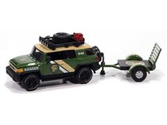 JOHNNY LIGHTNING #JLBT022-2 - 2014 Toyota FJ Cruiser with Small Open Trailer in Forrest Green and Tan